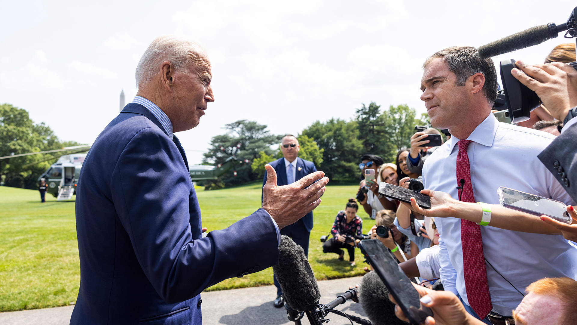 President Joe Biden answers questions from reporters about vaccine misinformation on social media platforms such as Facebook before heading to Camp David.