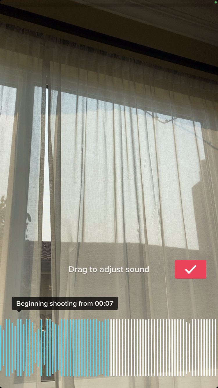 Drag the audio to adjust what section you're using in your TikTok.