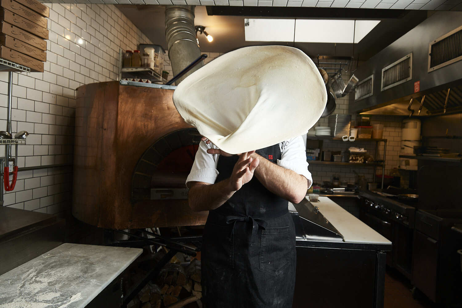 A robot that stretches dough would be more helpful for Chef Matthew Hyland.