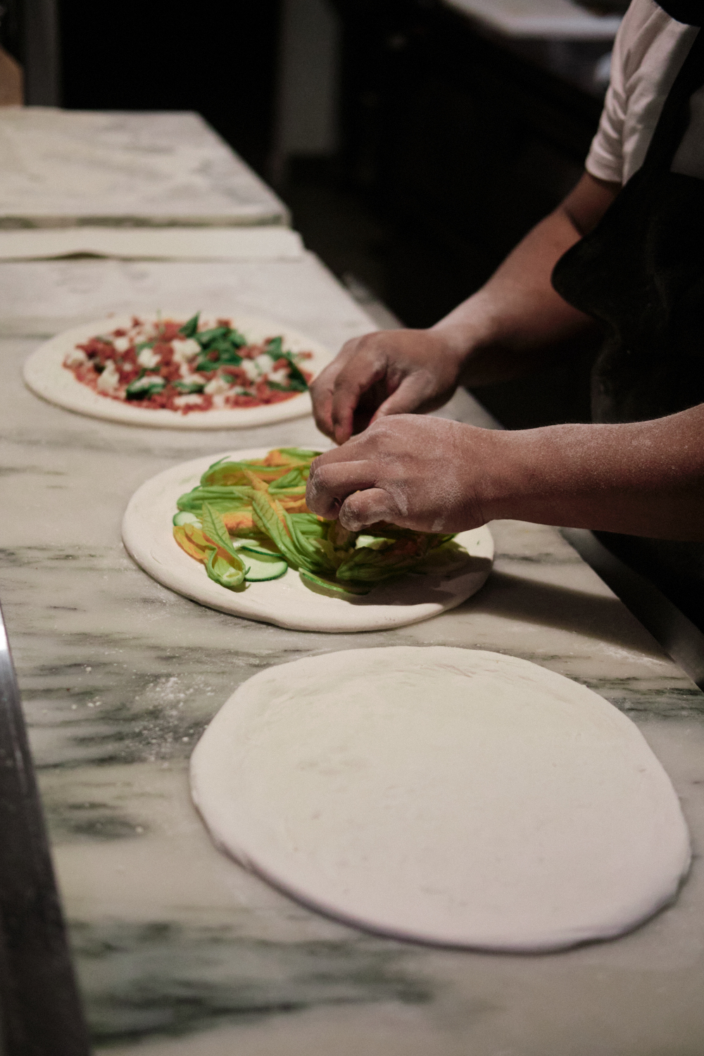 Chef Daniel Cutler of Ronan says customers like watching their pizzas being made by hand.