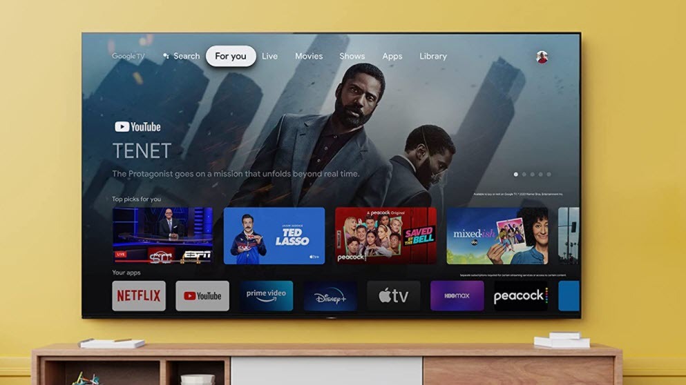 Sony 4K TV hanging on yellow living room wall with menu options open. 