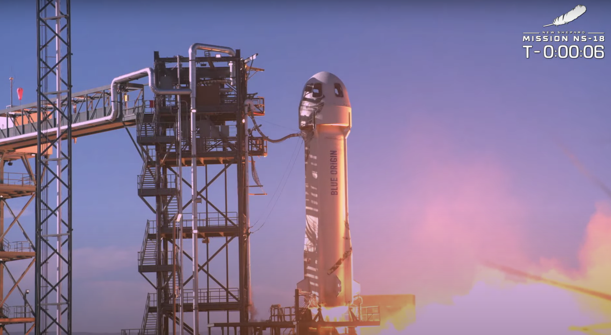 The Blue Origin rocket blasting off on Oct. 13, 2021.