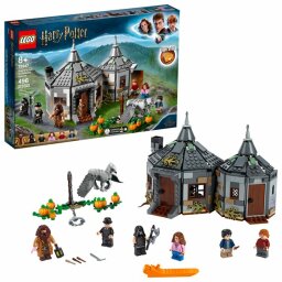 the LEGO Harry Potter Hagrid's Hut: Buckbeak's Rescue Building Set next to its packaging
