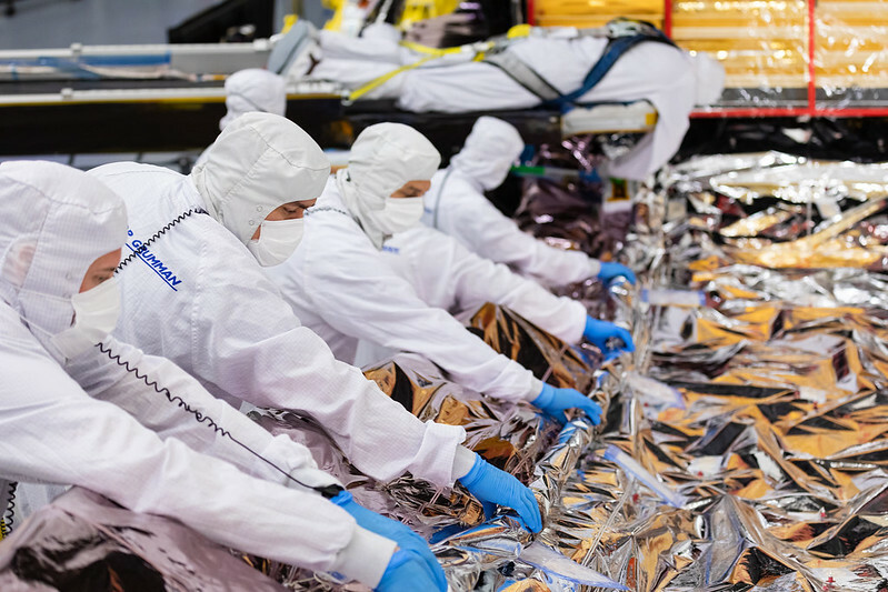 Northrop Grumman techs packing up the sunshield for the James Webb Space Telescope