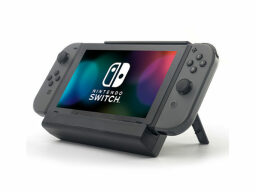 Black nintendo switch in charging case/stand