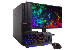 Black desktop with keyboard, mouse, and monitor showing rainbow graphic pattern