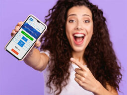 Excited person pointing to phone with Build Your Own Plan screen 