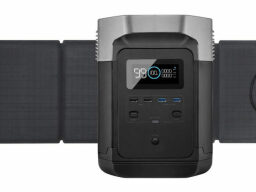 Black power station with four solar panels behind