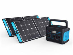 Black and blue solar panels next to matching power source with handle