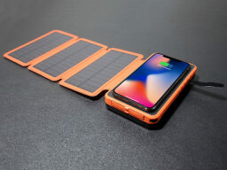 Orange phone case with three folded-out solar panels