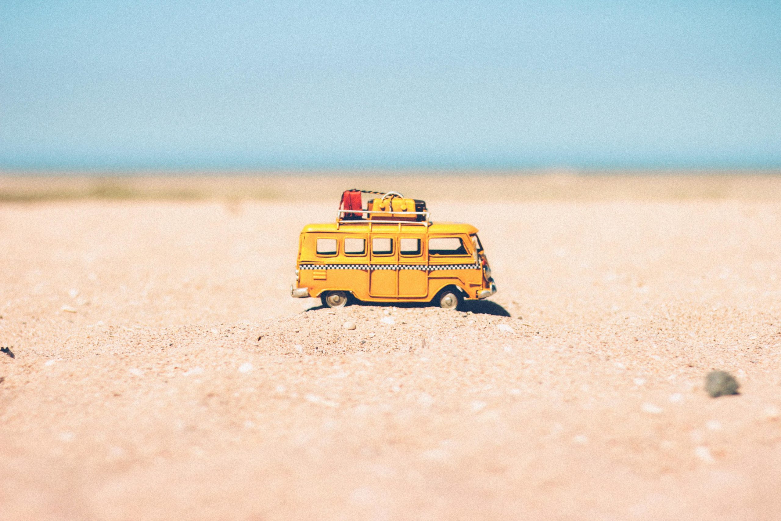 Toy car on beach