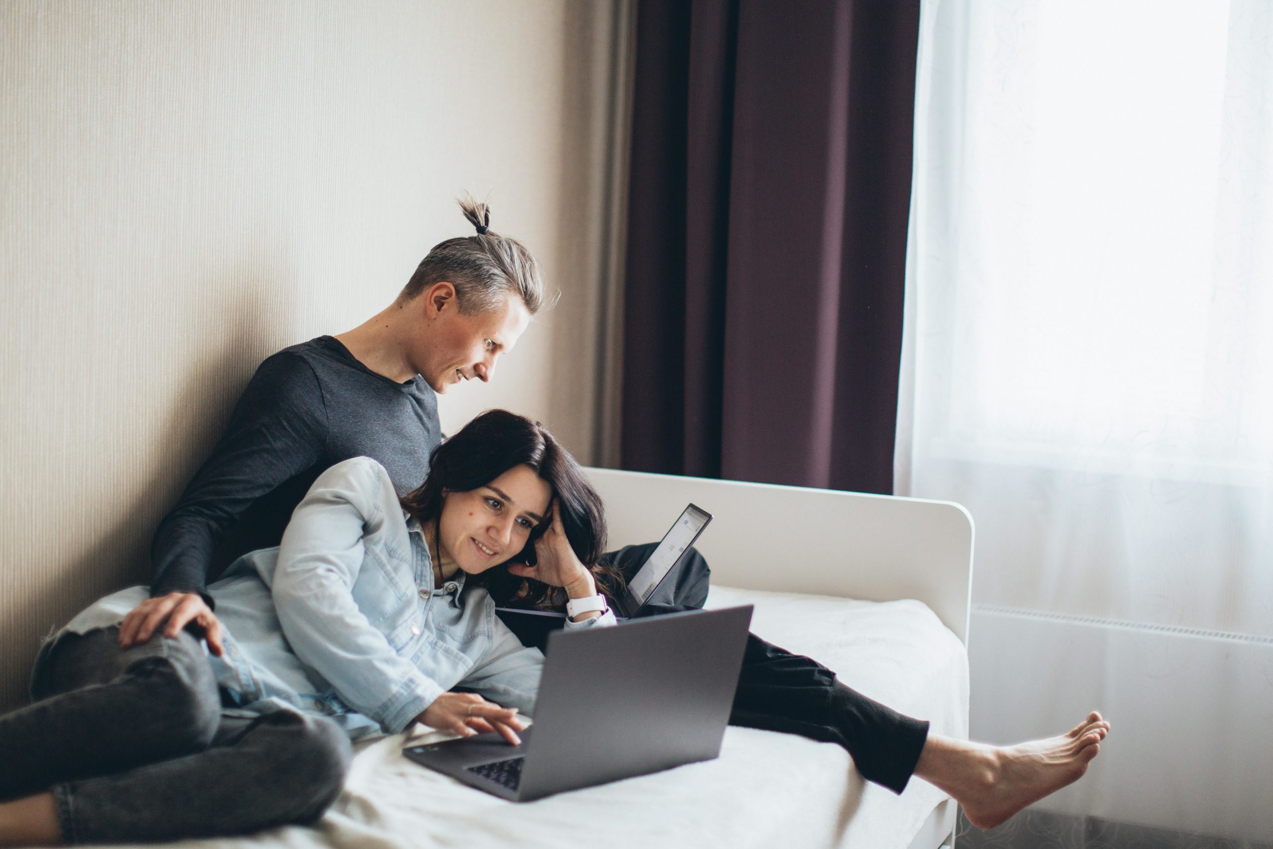 Couple watching laptop