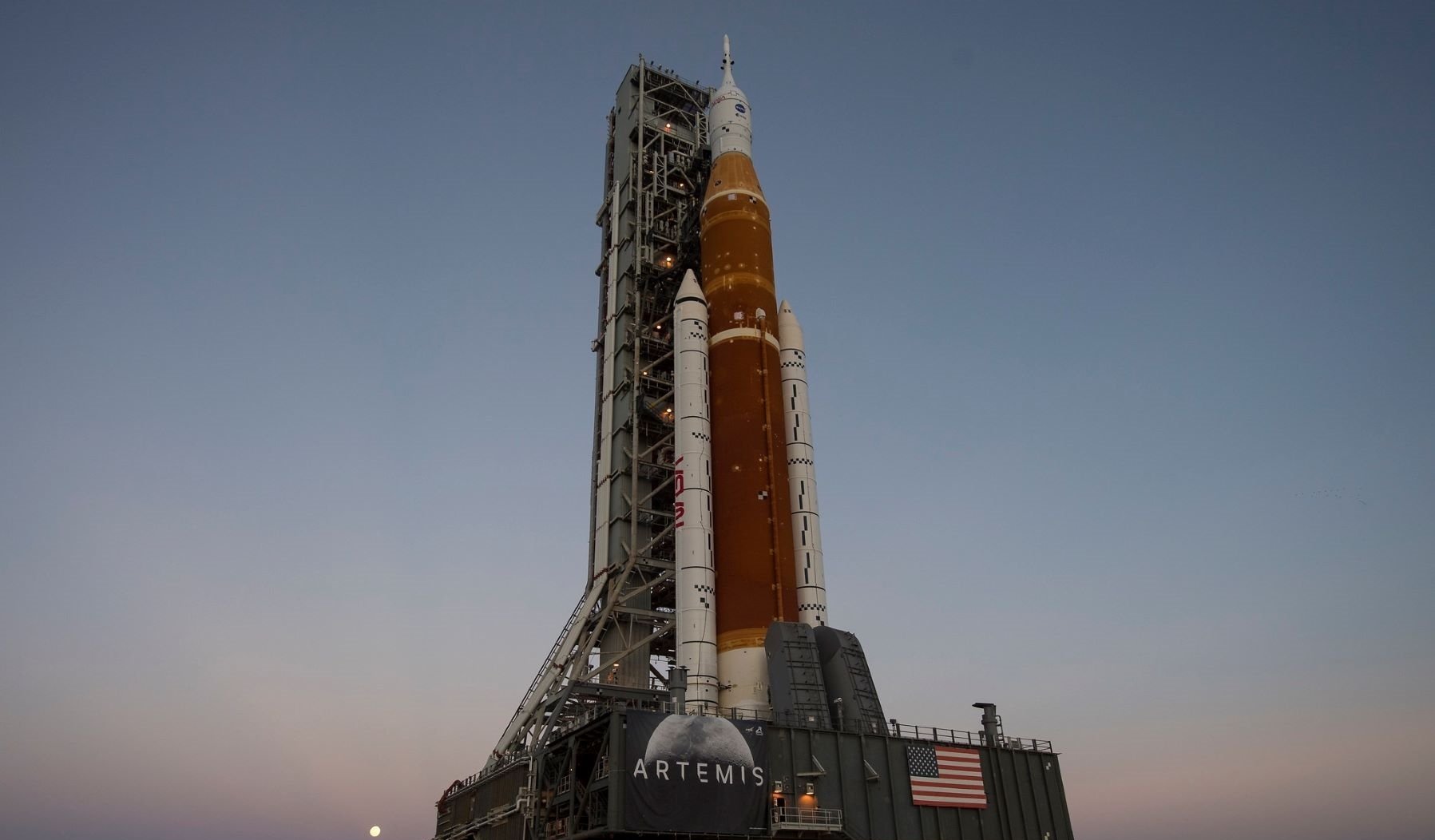 NASA's SLS rocket rolls out to its launchpad