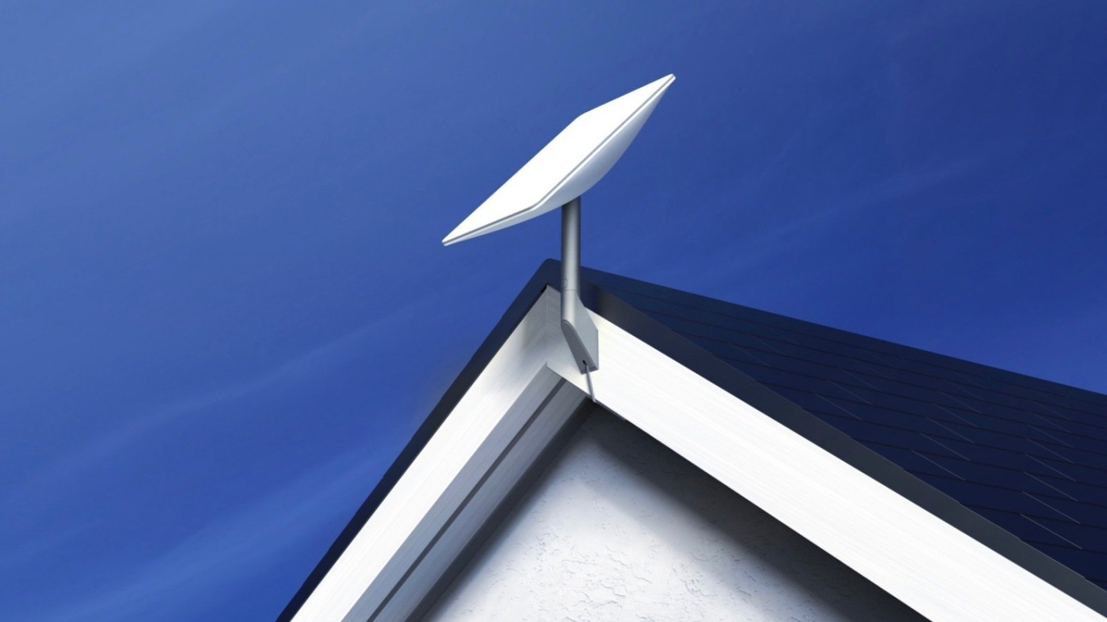 The point of a roof with a satellite on top.