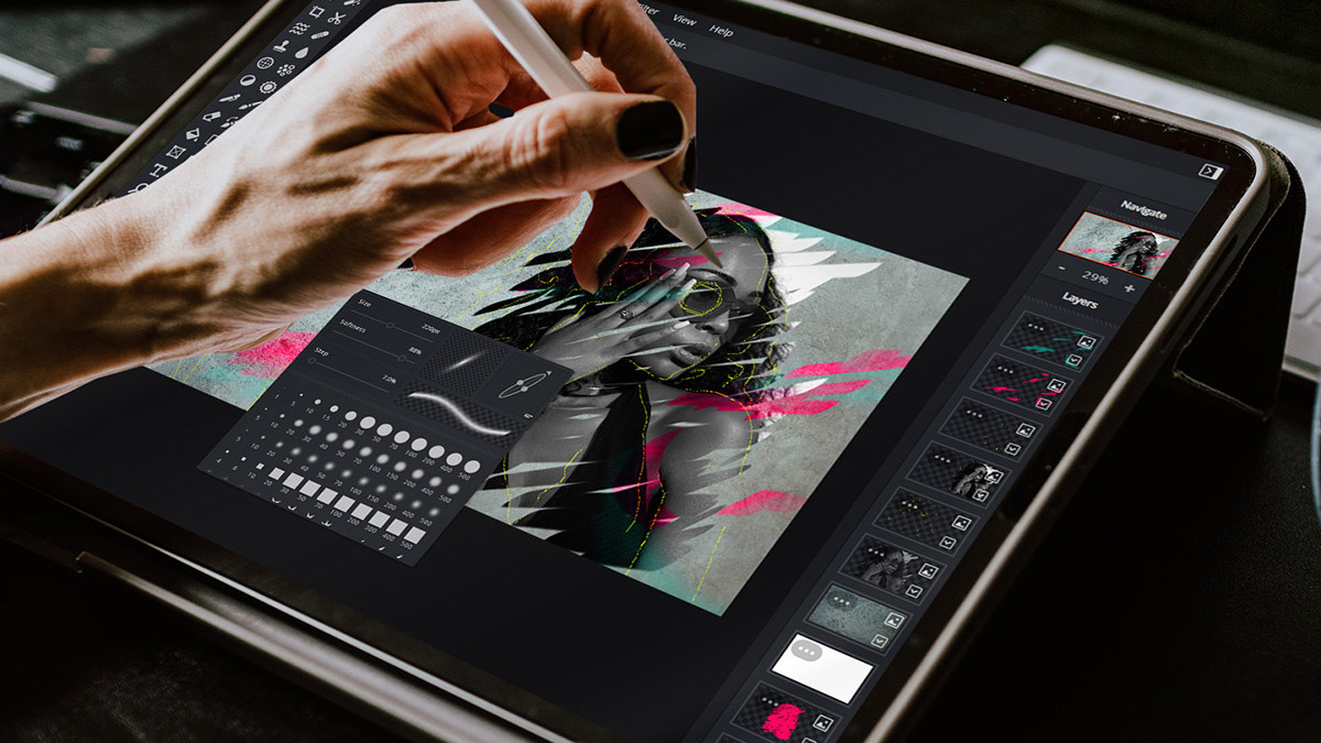 Hand using stylus to draw on tablet with photo editing app on screen