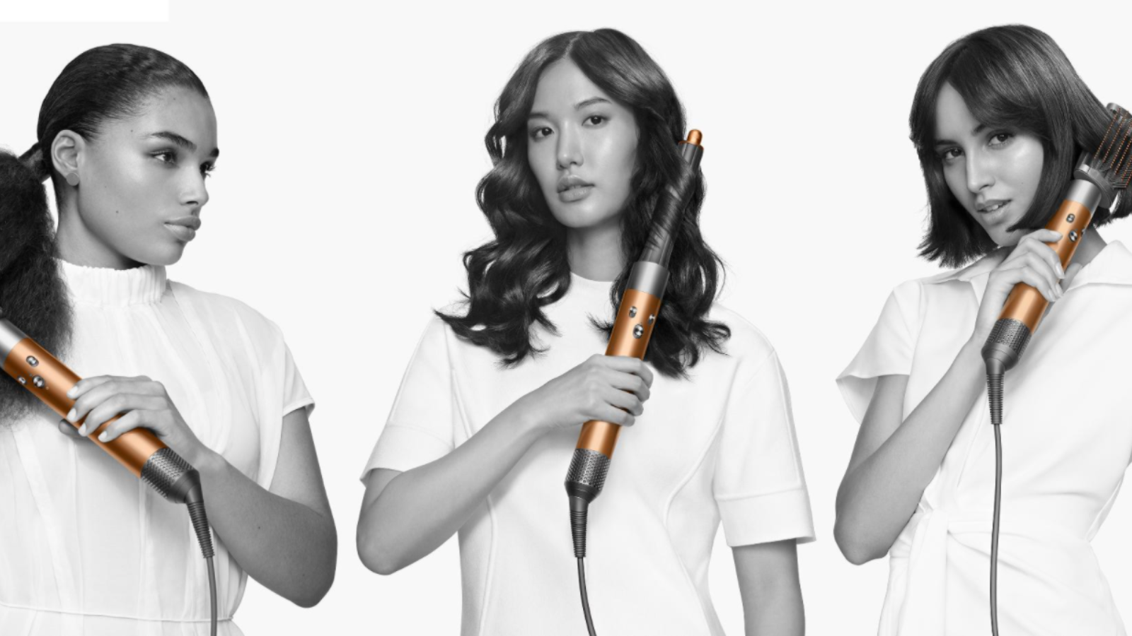 three women using the new dyson airwrap