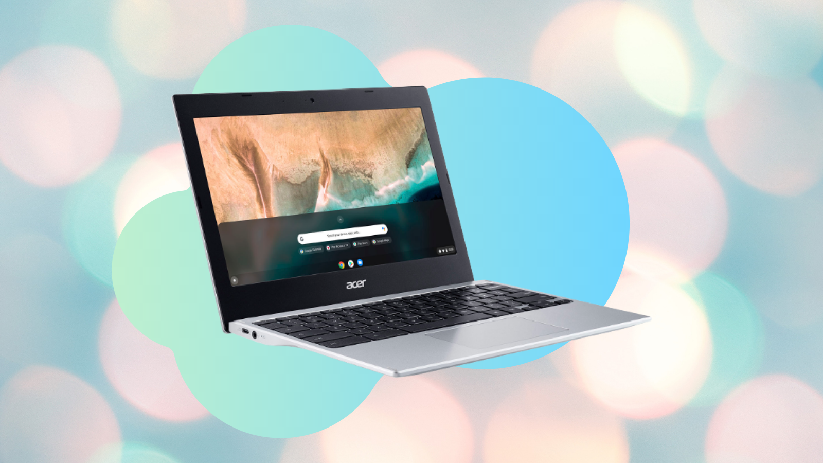 Open silver chromebook on blue and white background
