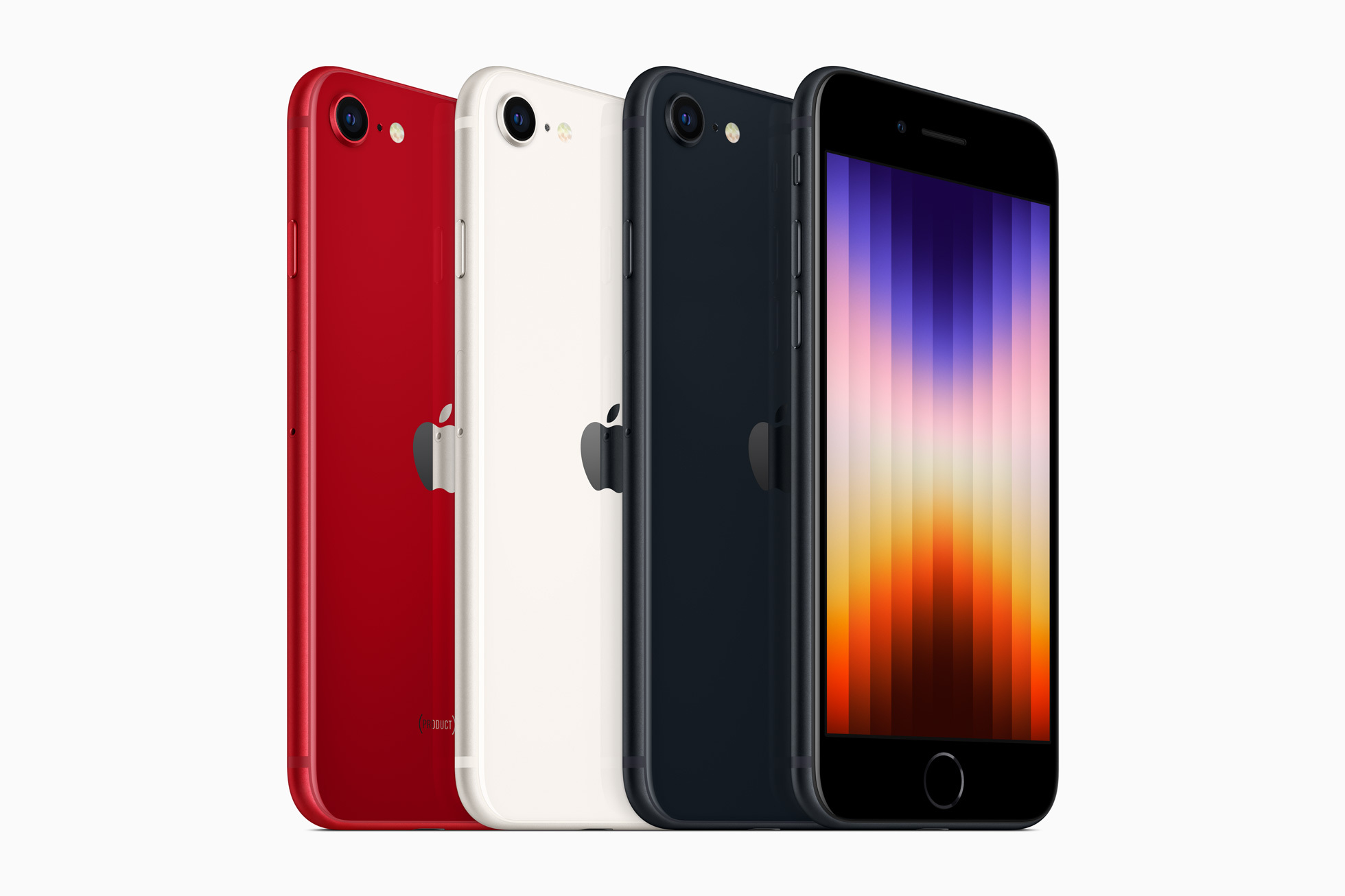 A red, white, and black iPhone lined up with a multicolored screen on the fourth phone on the right.