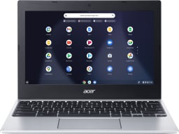 Silver chromebook with apps displayed on screen