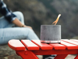 Aluminum fire pot on red table