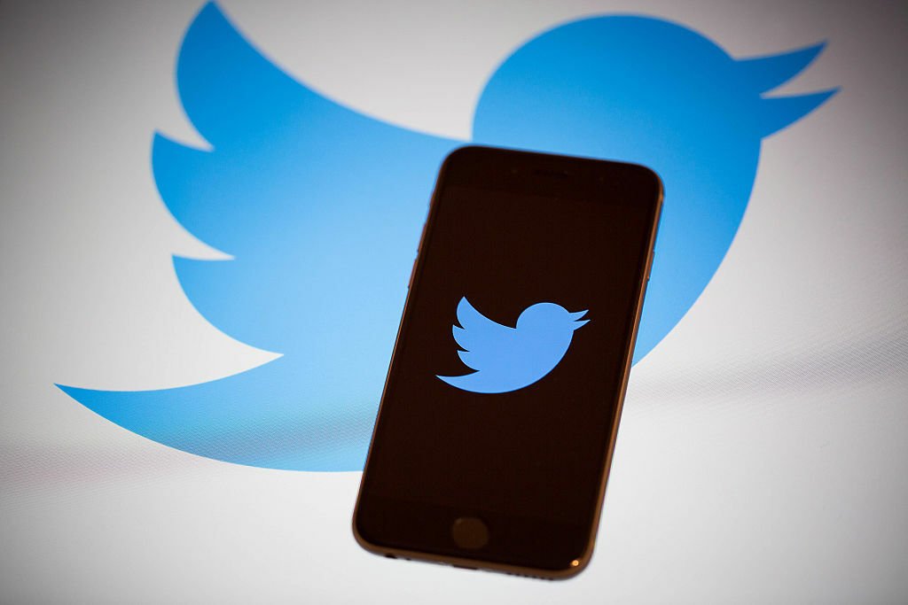 The Twitter logo on a smartphone.