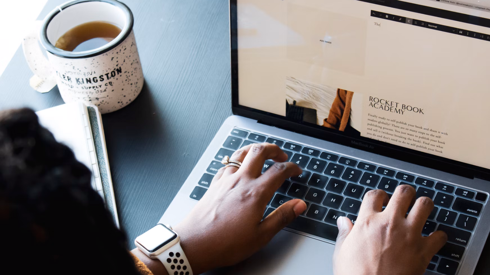 a woman writing a post on a squarespace blog