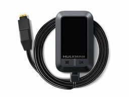 Black charger attached to cord and plug