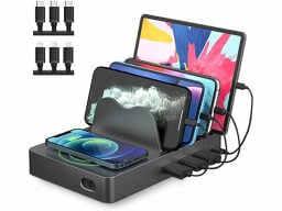 Black charger with four ports and a wireless charging spot