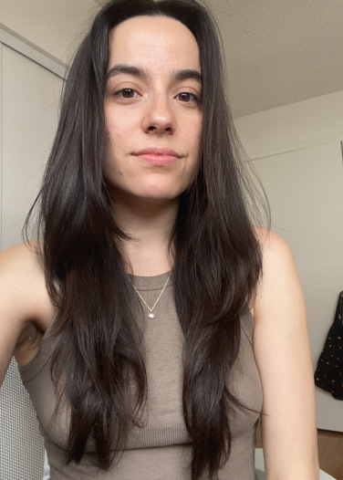 woman with completely styled, straight hair