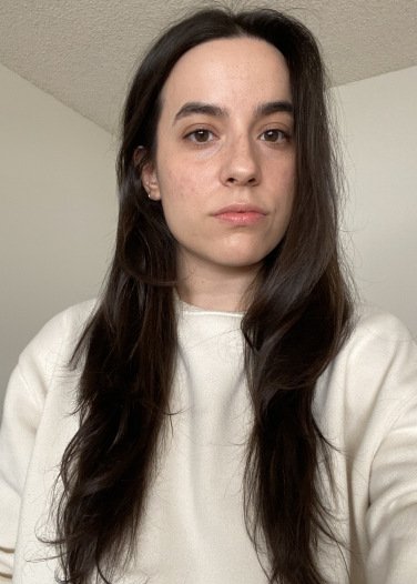 revlon one-step next to a blue blow dryer