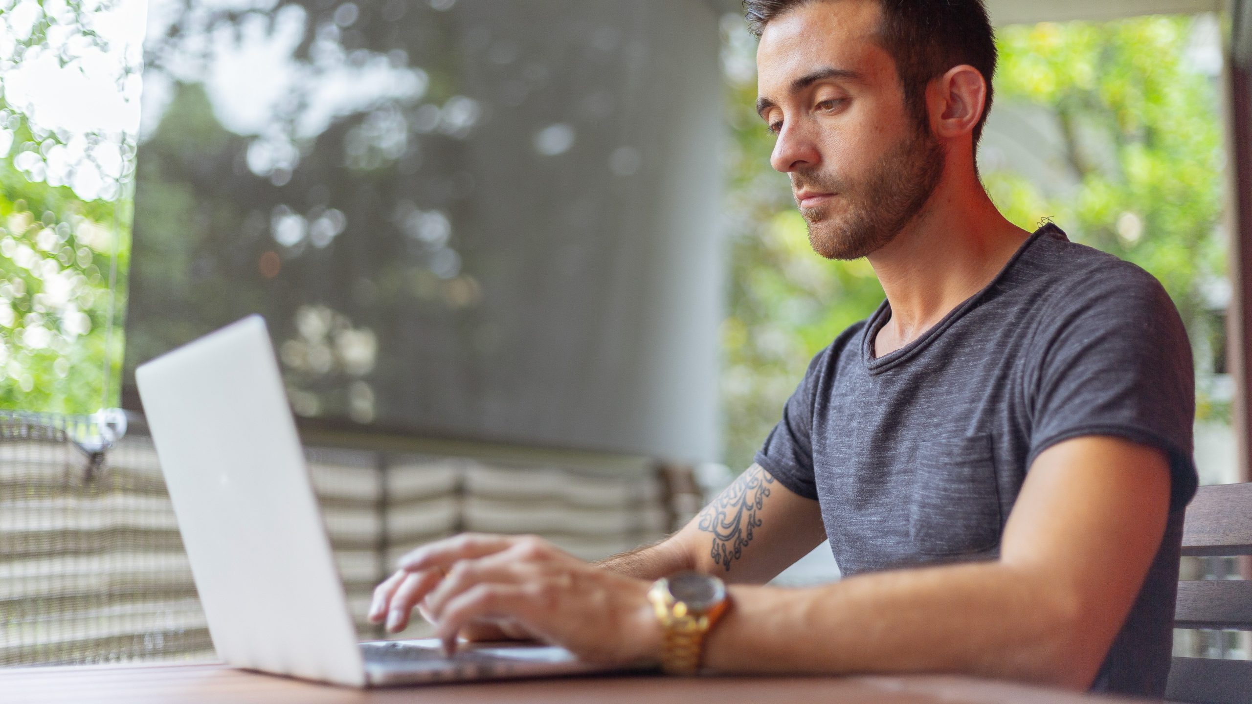 Person typing on laptop