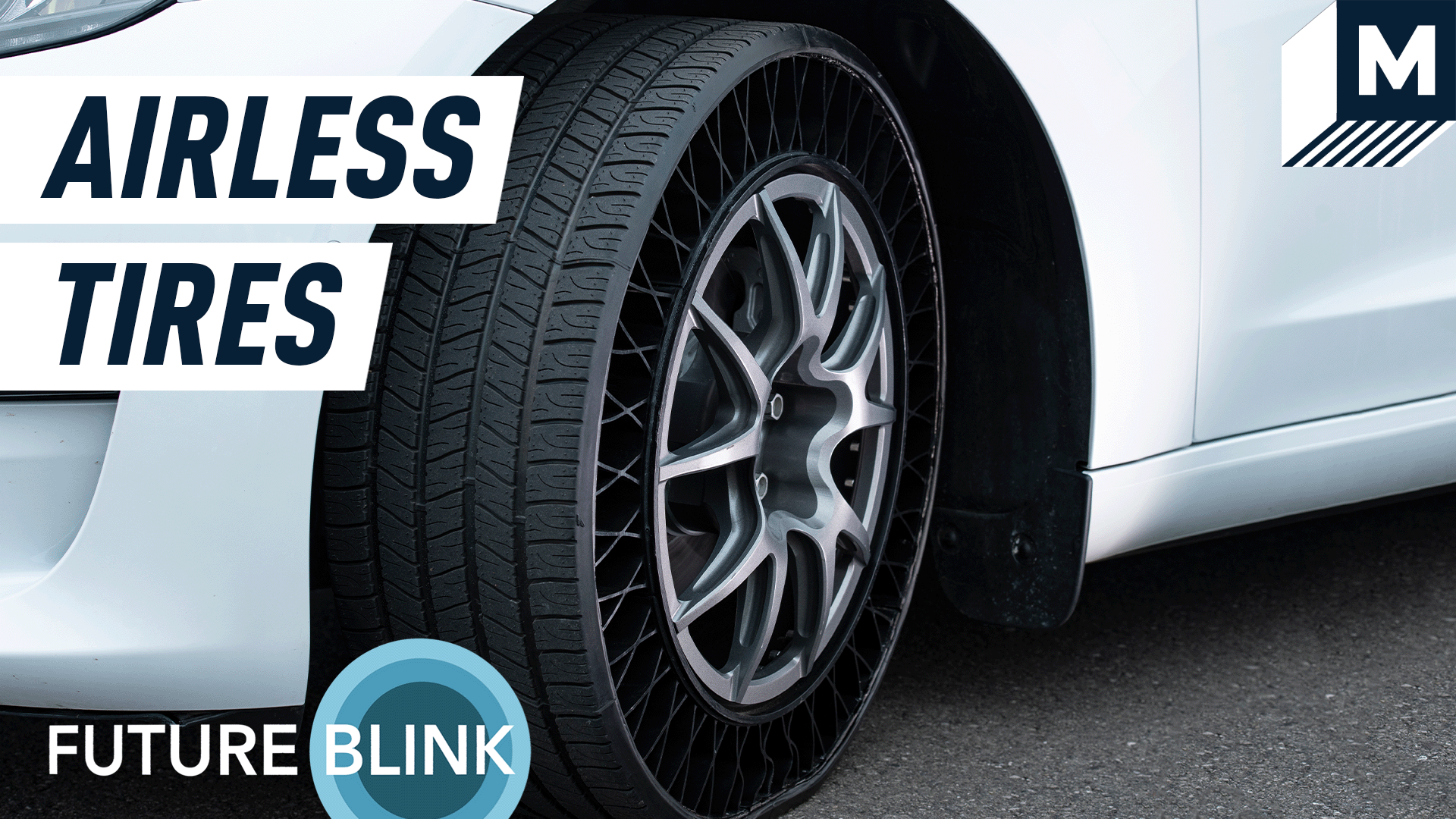 A close up of Goodyear's airless tire on a Model 3 Tesla.