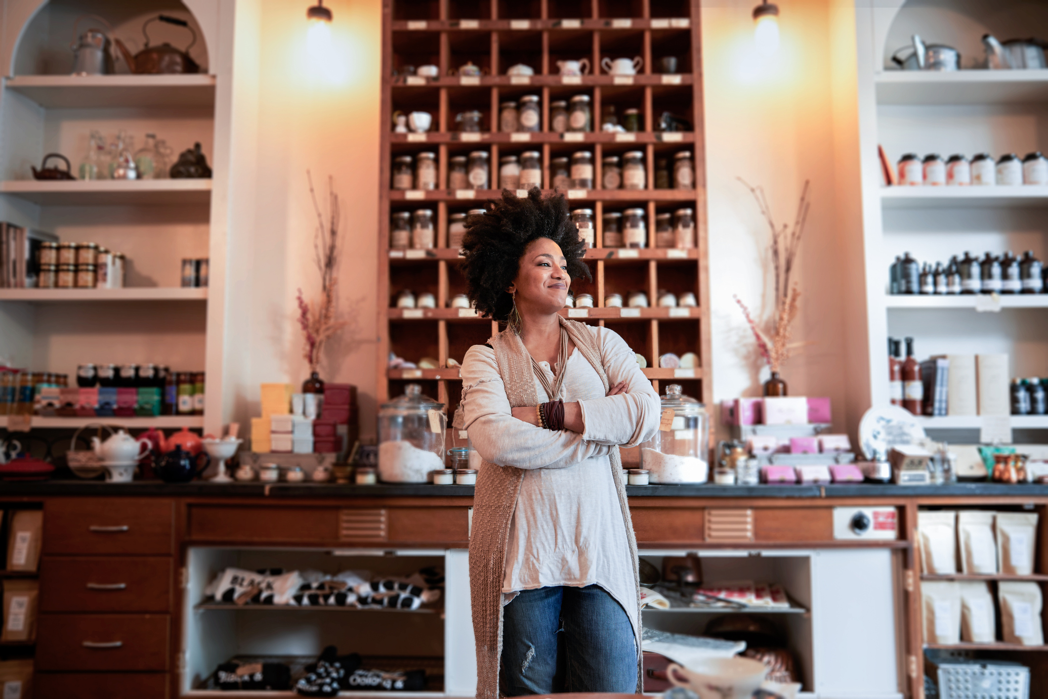 portrait of a woman standing in front of her small business