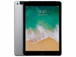 Grey iPad with beach lock screen