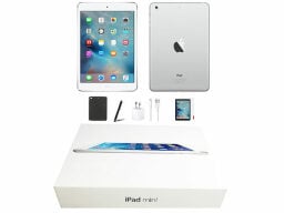 White ipad front and back with case, pen, charger, cord, and box below it