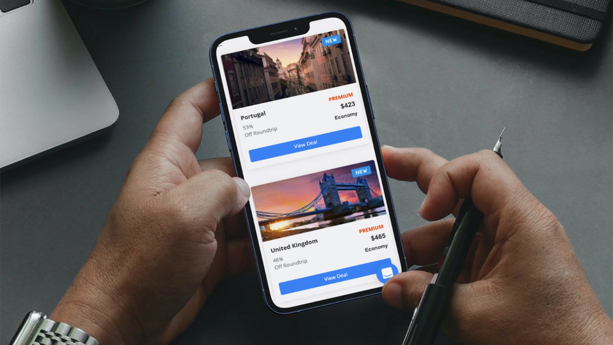 Hands holding phone with destination flight prices