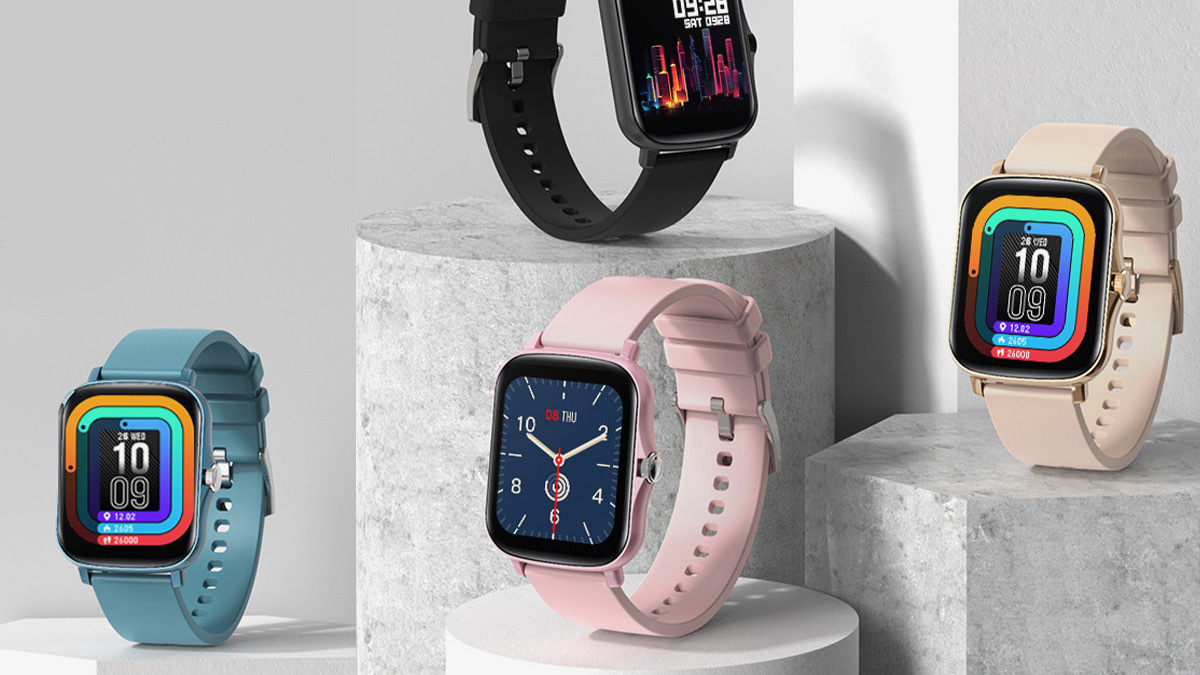 Four smart watches in different colors on marble pillars