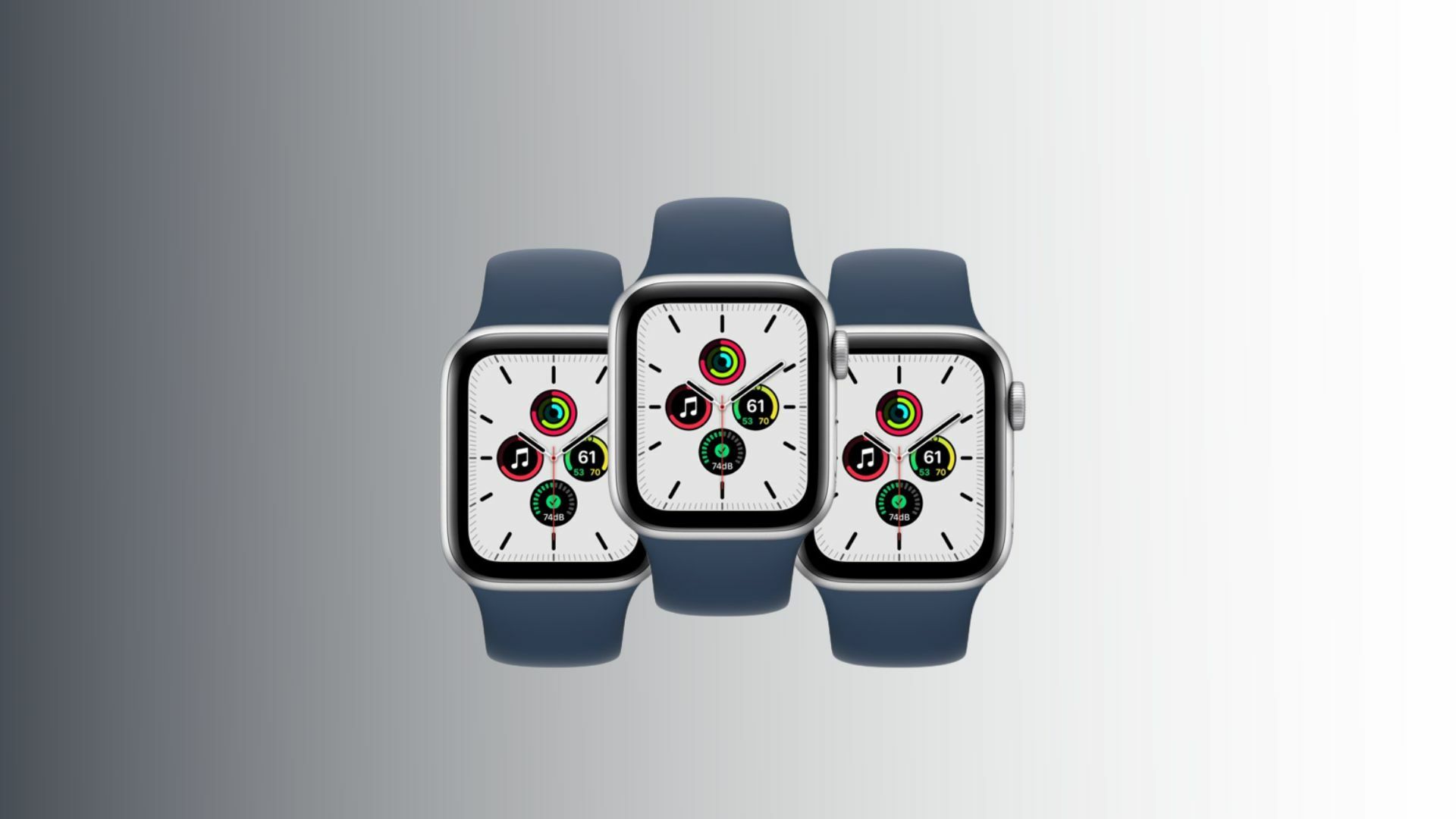 three silver and blue apple watches on a gray gradient background