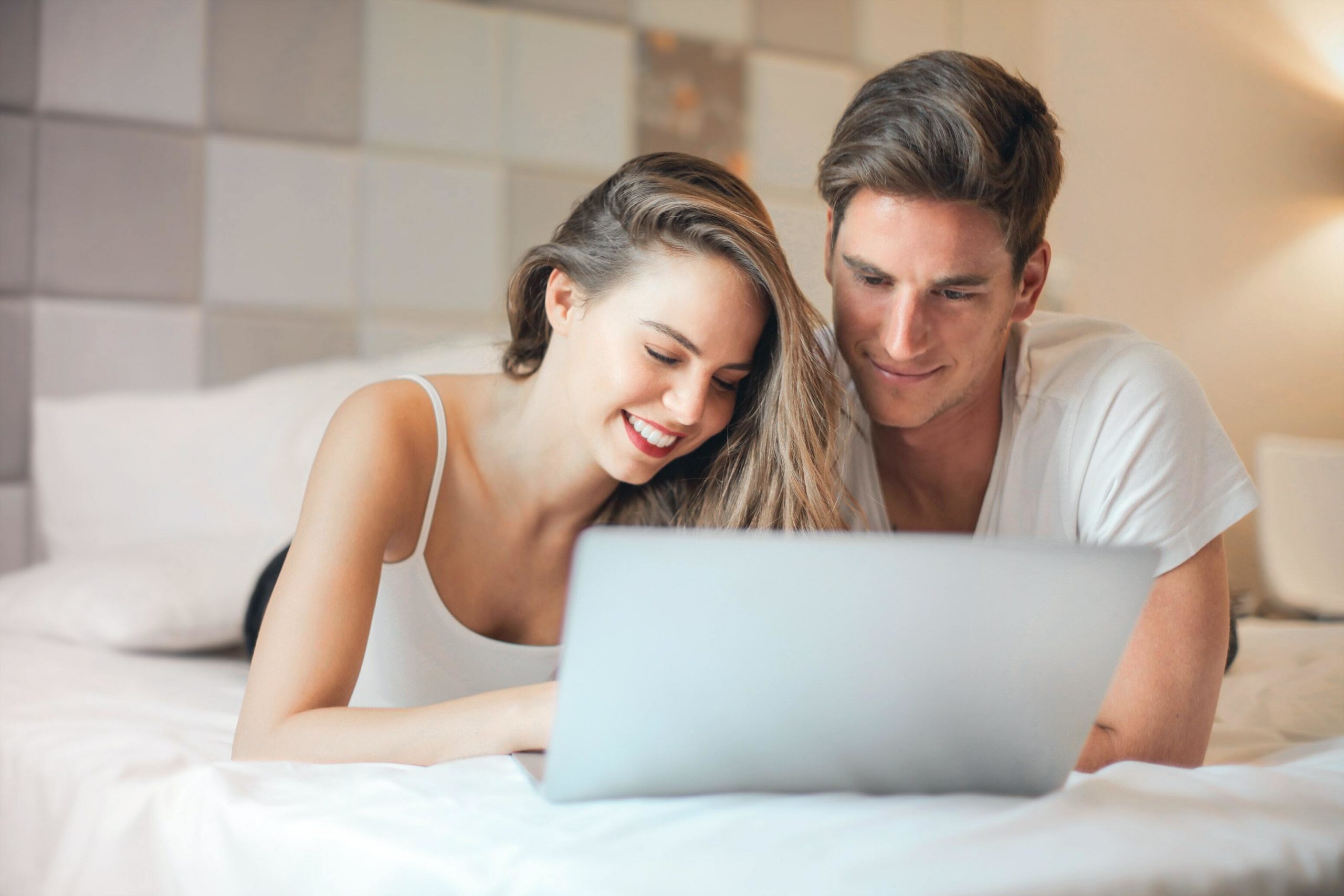 Couple watching laptop