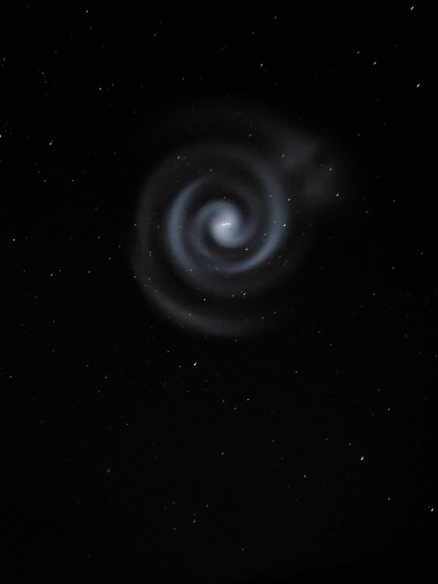 Blue spiral in the night sky