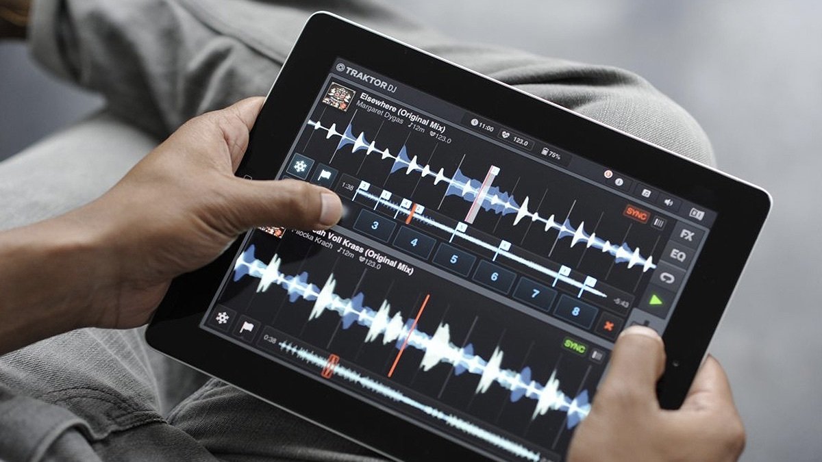 Person holding an Apple iPad Air 16GB - Space Gray (Grade B Refurbished: Wi-Fi Only) Bundle.