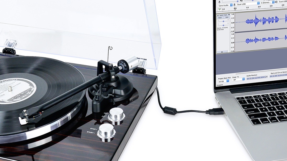 mbeat® PT-18K Bluetooth Vinyl Player connecting to a laptop on a white background.