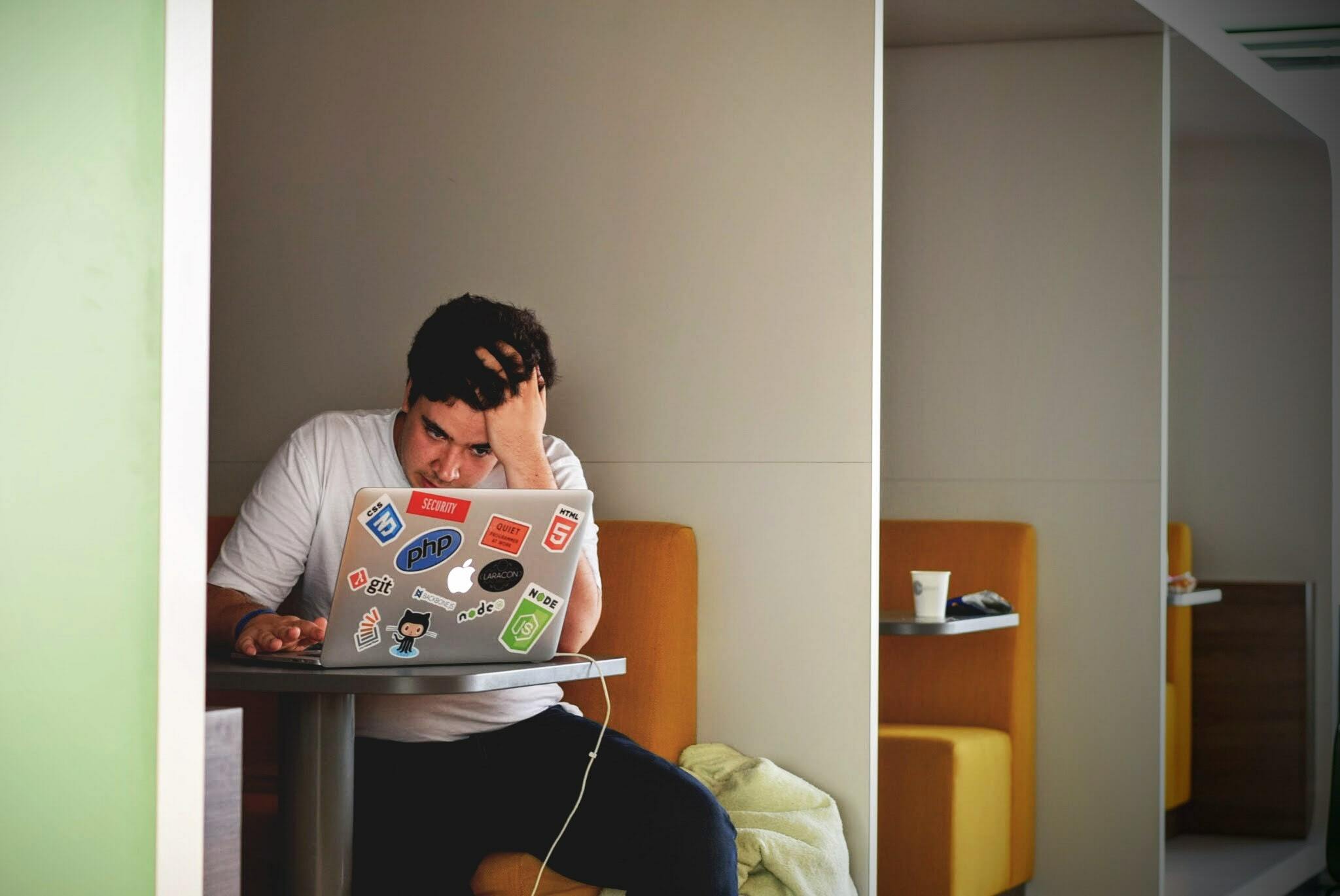 Man staring at laptop