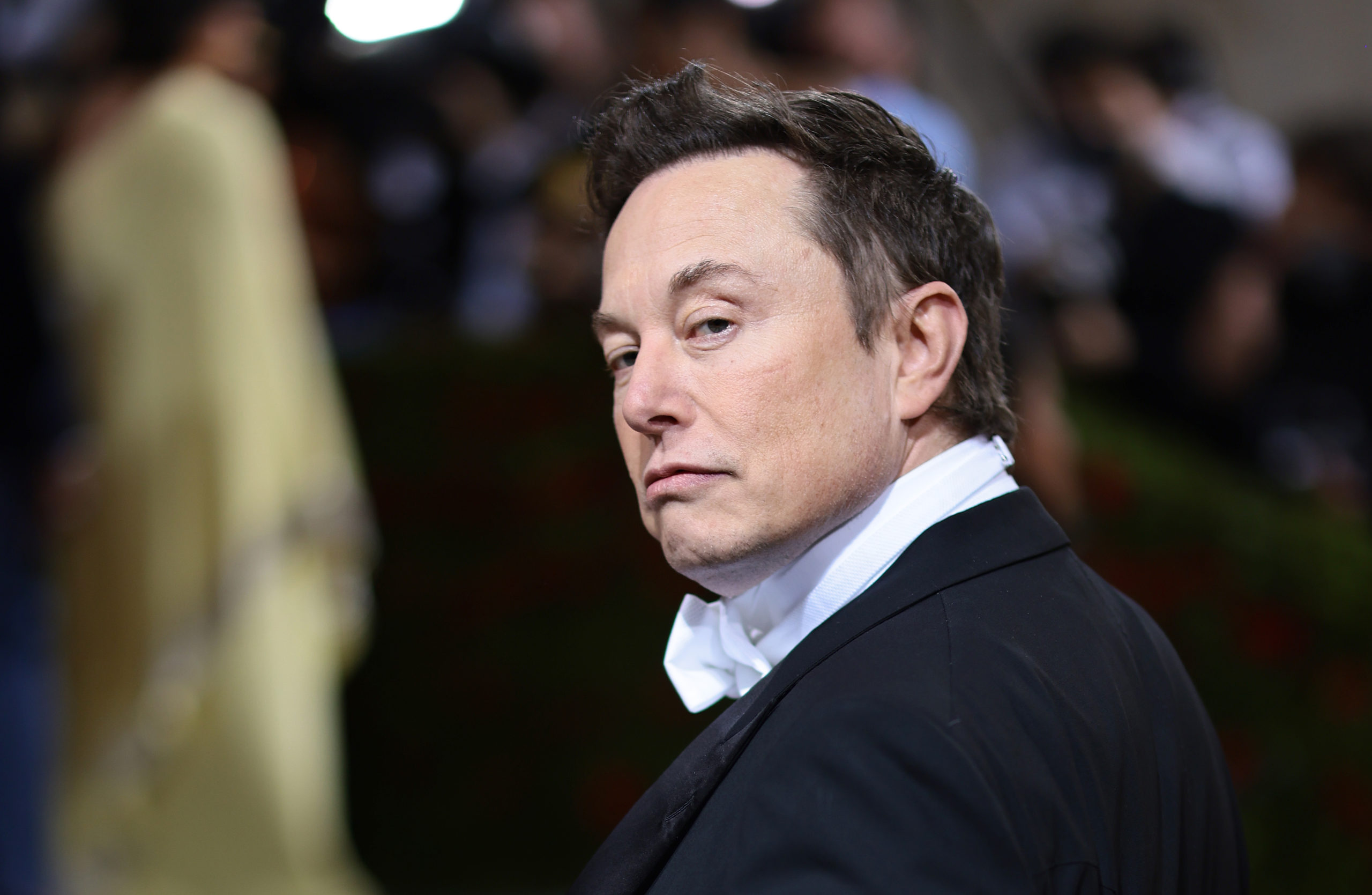 Elon Musk looking smug at the Met Gala