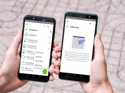 Person holding two phone with Koofr Cloud Storage: Lifetime Subscription (1TB).