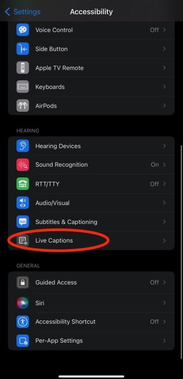 A screenshot of the iPhone accessibility settings with a red circle around the word "Live Captions".
