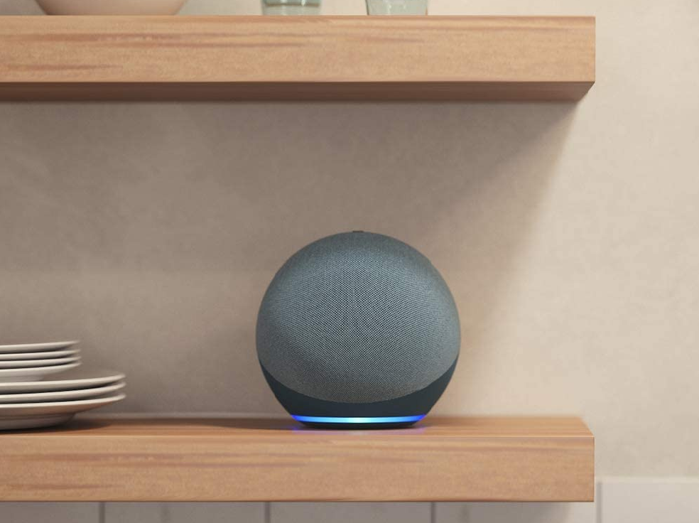 echo dot speaker on a shelf