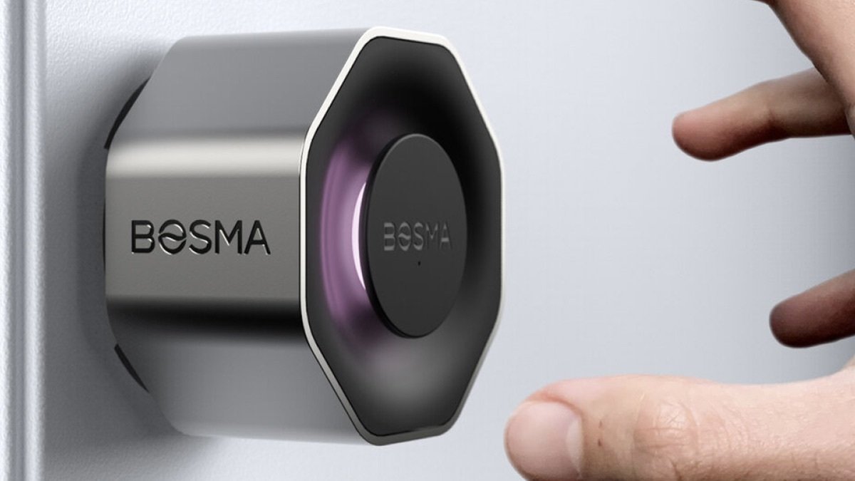 Person reaching for the BOSMA Aegis Smart Door Lock.
