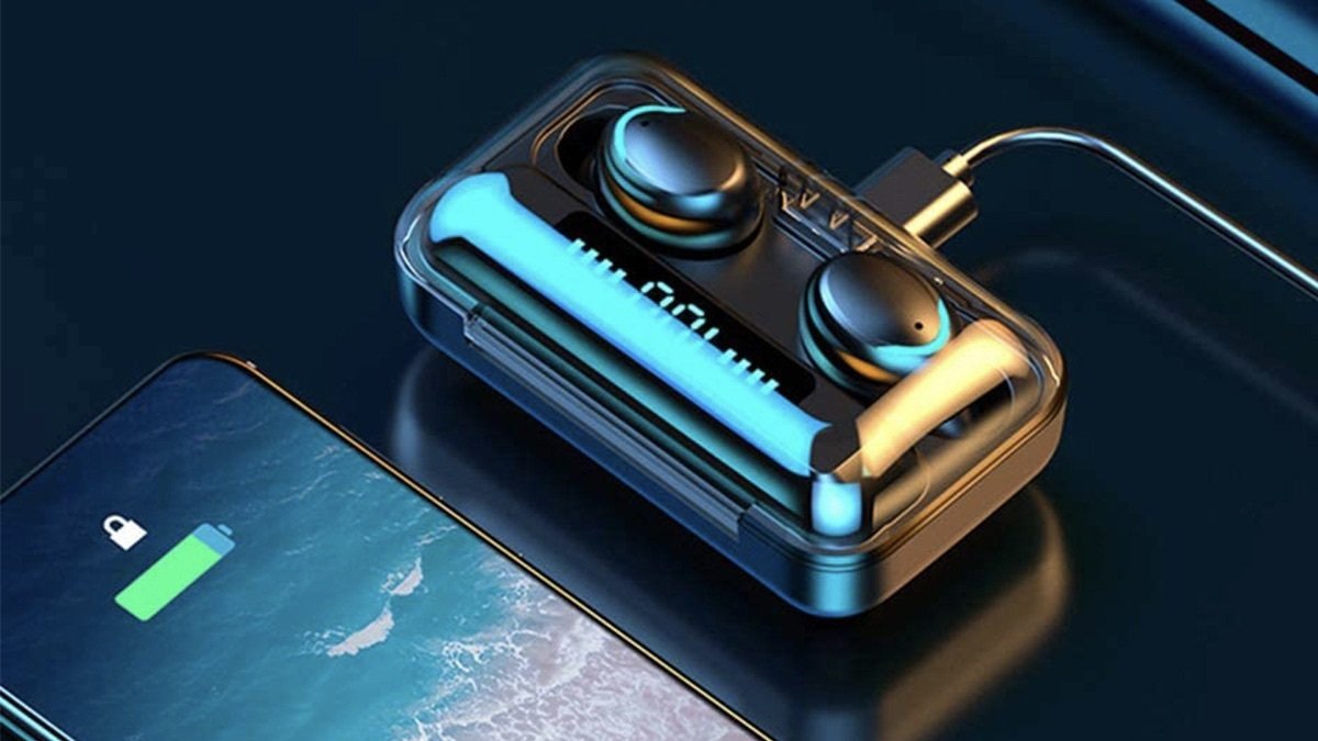 Black Flux 7 TWS Wireless Earbuds on a table.
