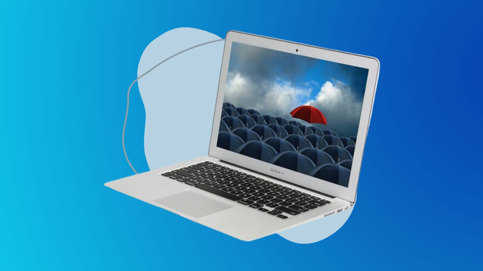 Refurbished MacBook Air on a colorful background.